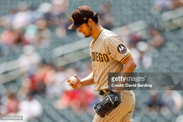 Yu Darvish of the San Diego Padres looks on before pitching to the Minnesota Twins in the first inning at Target Field on May 11, 2023 in...