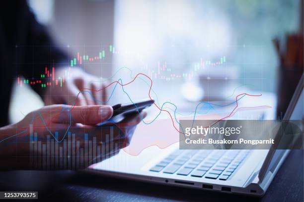 double exposure trading growth graph on business and investment. digital technology background. - investment research stock pictures, royalty-free photos & images