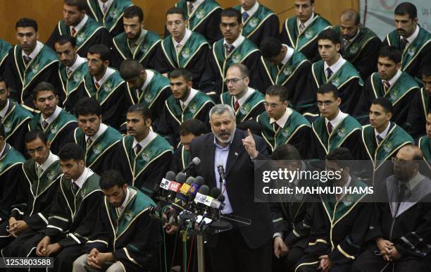 Sacked Palestinian prime minister Ismail Haniya speaks to students of the Islamic University during their graduation ceremony in Gaza City, 21 July...