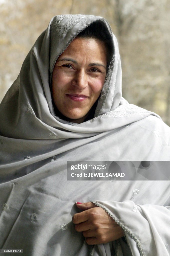 Sho Rao Rafiq Soraya Rafiq, an Afghan teacher, poses for photograhs 25 February ...