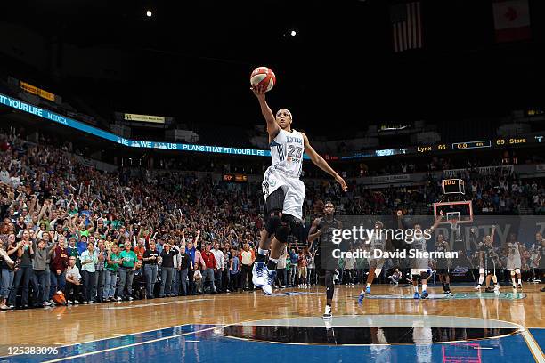 Maya Moore of the Minnesota Lynx on the break away in the final moments of the game against the San Antonio Silver Stars in Game One of the Western...