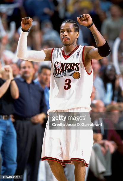 Allen Iverson of the Philadelphia 76ers celebrates against the Milwaukee Bucks in Game one of the 2001 Eastern Conference Finals on May 22, 2001 at...