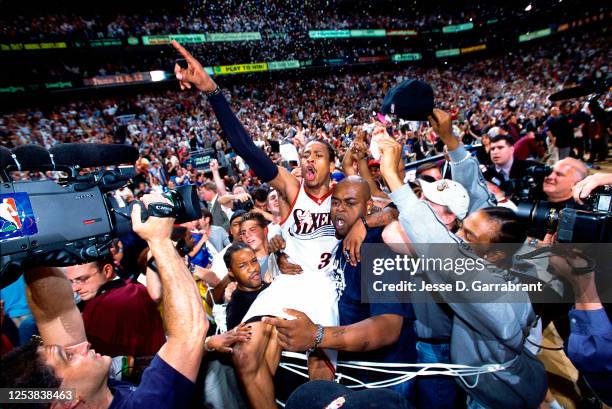 Allen Iverson of the Philadelphia 76ers celebrates against the Milwaukee Bucks in Game seven of the 2001 Eastern Conference Finals on June 3, 2001 at...