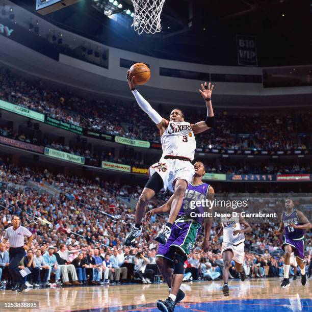 Allen Iverson of the Philadelphia 76ers shoots against Ray Allen of the Milwaukee Bucks in Game one of the 2001 Eastern Conference Finals on May 22,...