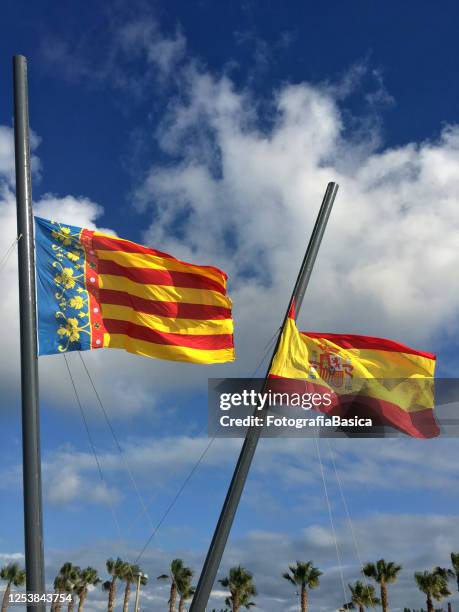 valencian and spanish flags at half mast - half mast stock pictures, royalty-free photos & images