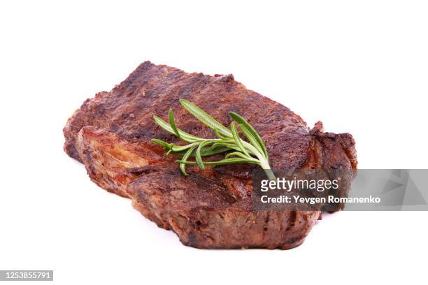 roasted steak on white background - steak stock pictures, royalty-free photos & images