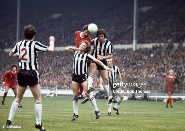 John Toshack of Liverpool rises above Newcastle United defenders Pat Howard and Bobby Moncur during the FA Cup final between Liverpool and Newcastle...