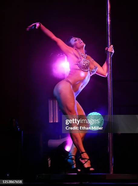 Entertainer Jennifer Romas dances during a performance of "SEXXY: The Show" at the Dreamland Drive-In Theater and Concert Venue at Fresh Wata Studios...