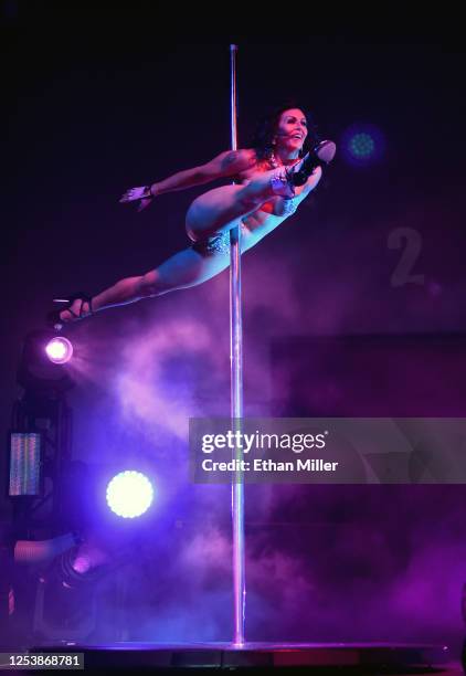 Entertainer Jennifer Romas dances during a performance of "SEXXY: The Show" at the Dreamland Drive-In Theater and Concert Venue at Fresh Wata Studios...