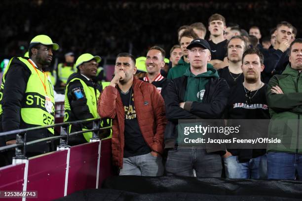 Alkmaar fans look disappointed during the UEFA Europa Conference League semi-final first leg match between West Ham United and AZ Alkmaar at London...