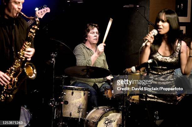 Drummer Phil Gould of Level 42 performs live on stage at Ronnie Scott's Jazz Club in Soho, London on 20th September 2010.