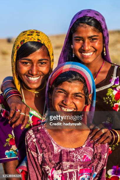 group of happy gypsy indian girls, desert village, india - local gypsy stock pictures, royalty-free photos & images