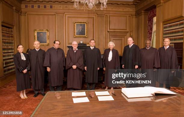 Supreme Court Justices pose for the first picture of the Roberts Court in the Chief Justice Conference Room 03 October 2005 at the Supreme Court in...