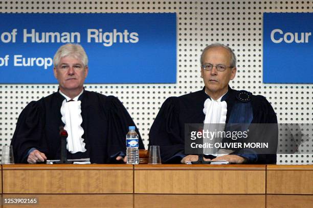 President of the European Court of Human Rights Luzius Wildhaber , assisted by Paul Mahoney, are seen prior an audience, 12 May 2005 in Strasbourg....