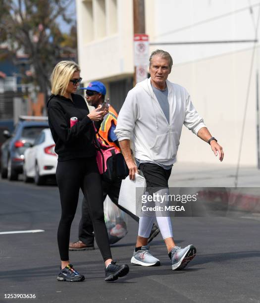 Dolph Lundgren and fiancee Emma Krokdal are seen arriving at the gym on May 11, 2023 in Los Angeles, California.
