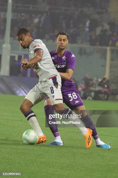 Rolando Mandragora of ACF Fiorentina and Andy Diouf of FC Basilea 1893 ,battle for the ball during UEFA Europa Conference League Semi final First Leg...