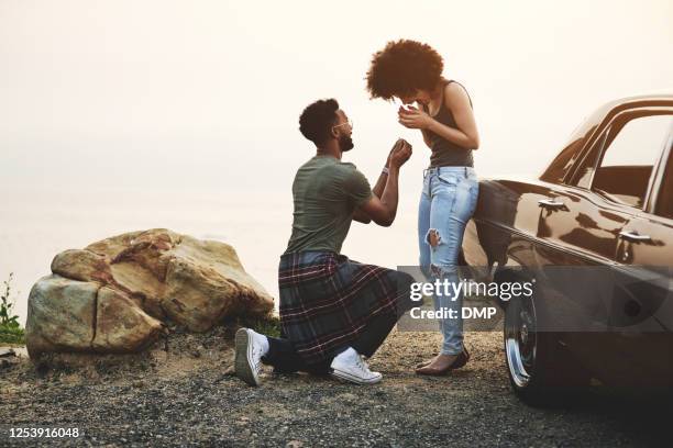 he took her somewhere special to pop the question - black women engagement rings stock pictures, royalty-free photos & images