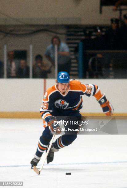 Wayne Gretzky of the Edmonton Oilers skates against the New York Rangers during an NHL Hockey game circa 1979 at Madison Square Garden in the...