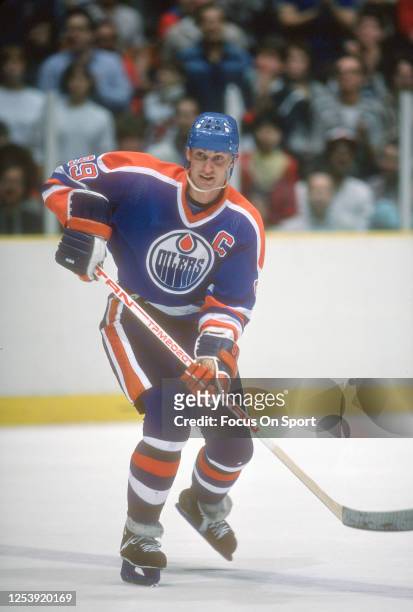 Wayne Gretzky of the Edmonton Oilers skates the New Jersey Devils during an NHL Hockey game circa 1984 at the Brendan Byrne Arena in East Rutherford,...
