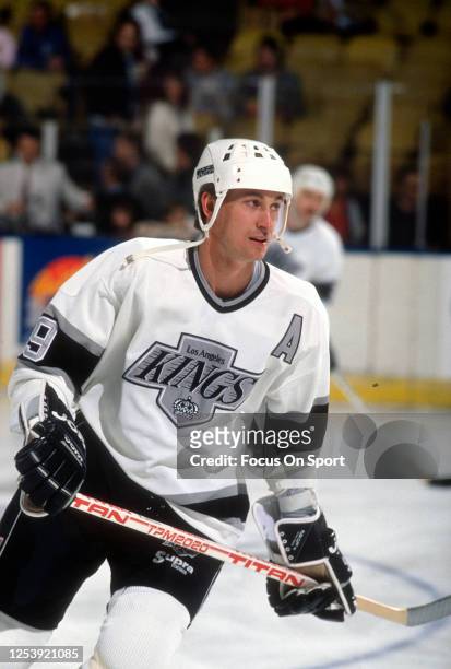 Wayne Gretzky of the Los Angeles Kings skates during an NHL Hockey game circa 1995 at the Great Western Forum in Los Angeles, California. Gretzky's...