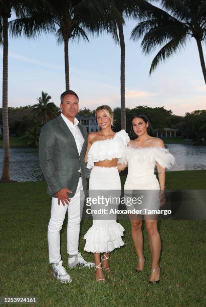 Thomas "TJ" Earle, Alix Earle and Ashley Alexandra Dupre are seen during Alix Earle's University of Miami graduation celebration on May 11, 2023 in...