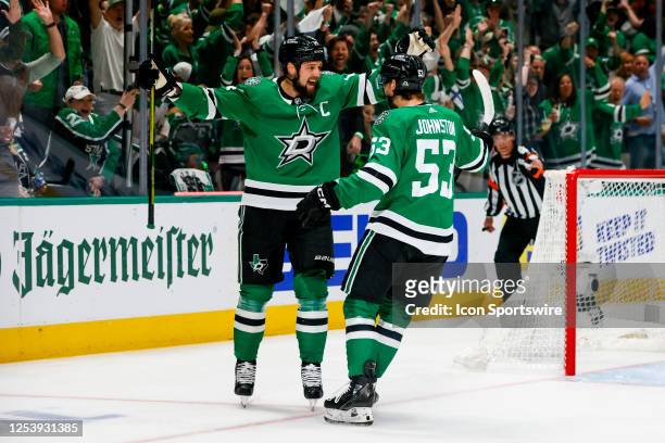 Dallas Stars center Wyatt Johnston celebrates with left wing Jamie Benn after scoring a goal during the Western Conference Second Round game 5...