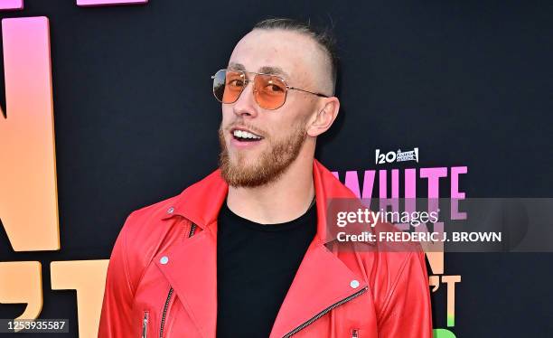 Football tight end from the San Francisco 49ers George Kittle arrives for the premiere of "White Men Can't Jump" at the El Capitan Theatre in...