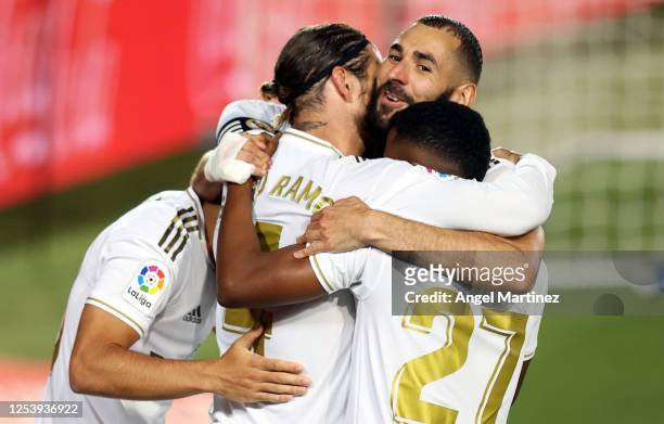 Sergio Ramos of Real Madrid celebrates his team's first goal with teammates during the Liga match between Real Madrid CF and Getafe CF at Estadio...