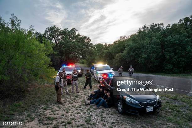 March 27 : Kinney County sheriff's Deputy Rolando Escobar, left, arrives as the only Spanish speaker on scene as officers visiting from Galveston TX...