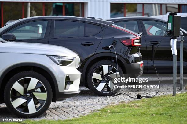 Volvo electric passenger car is being charged in the parking lot of the Volvo Trucks headquarters in Gothenburg, Sweden, on May 4, 2023.