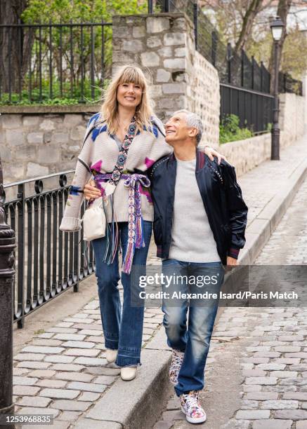 Tv presenter Nagui and wife Melanie Page are photographed for Paris Match on March 23, 2023 in Paris, France.