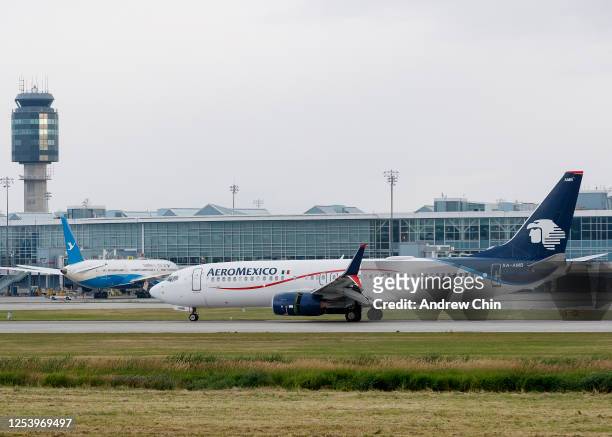 An Aeromexico Boeing 737-800 flight AM696 from Mexico City lands at Vancouver International Airport on July 2, 2020 in Richmond, British Columbia,...
