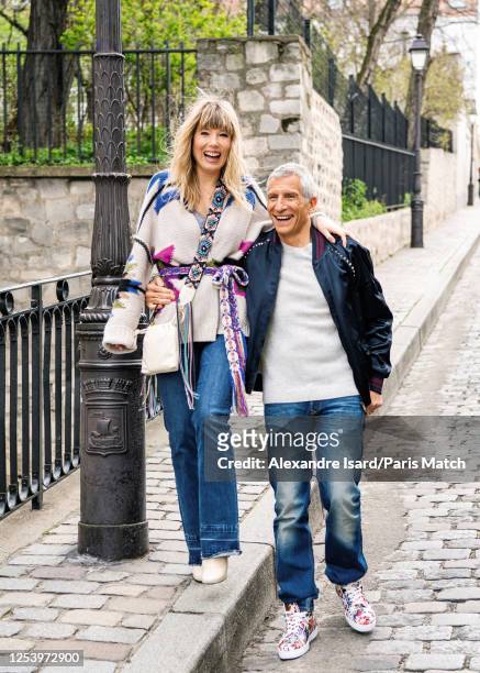 Tv presenter Nagui and wife Melanie Page are photographed for Paris Match on March 23, 2023 in Paris, France.