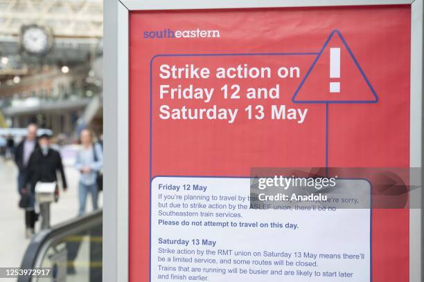 View of a signboard at a railway station while thousands of railway workers go on strike due to the ongoing disagreement over the salary increase in...