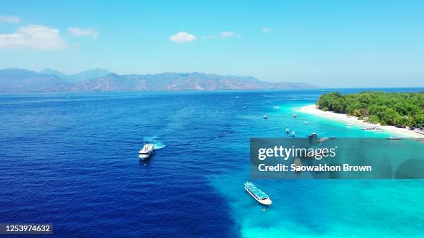 taxi boat travel around the island in indonesia - gili trawangan stock pictures, royalty-free photos & images