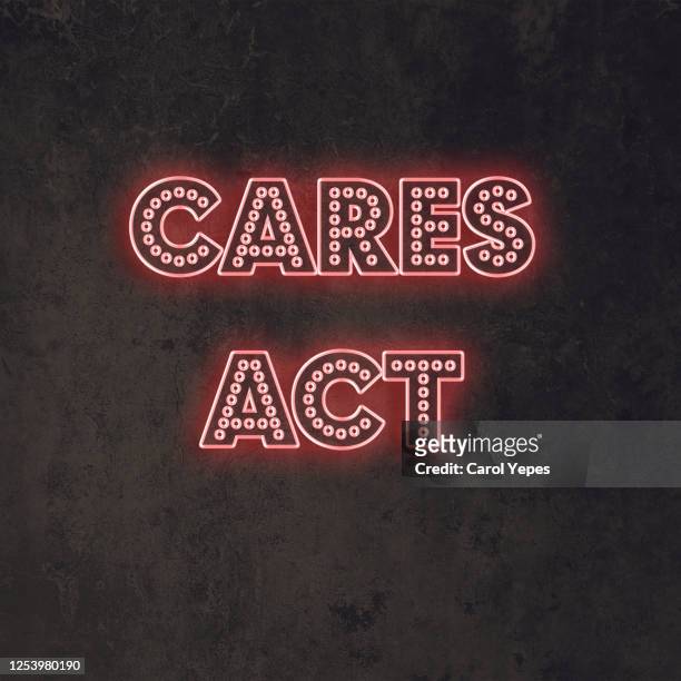 cares act text in neon lights - cares act - fotografias e filmes do acervo
