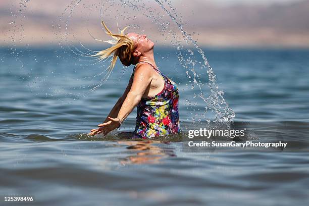 refreshing moment - swimming costume stock pictures, royalty-free photos & images