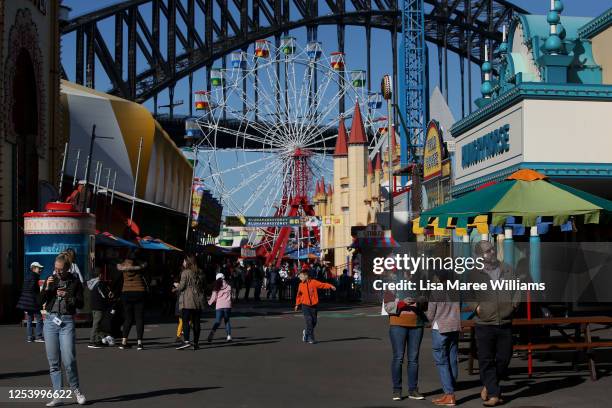 Guests visit Luna Park following a period of lockdown on July 03, 2020 in Sydney, Australia. Sydney's Luna Park has reopened to the public following...