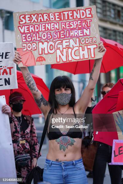 Sex workers protest near the Bundesrat against coronavirus lockdown measures that prevent them from returning to work on July 03, 2020 in Berlin,...