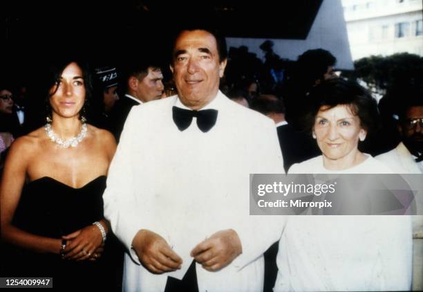 Media proprietor and fraudster, Robert Maxwell at a party on his yacht with daughter Ghislaine and wife Elisabeth circa 1990.