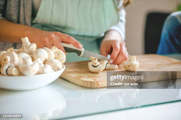 cutting mushrooms - chopped food stock pictures, royalty-free photos & images