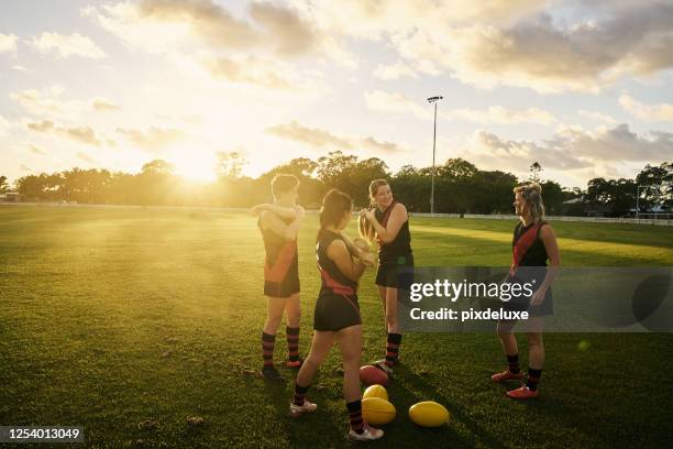 getting ready to play a good game - woman afl stock pictures, royalty-free photos & images