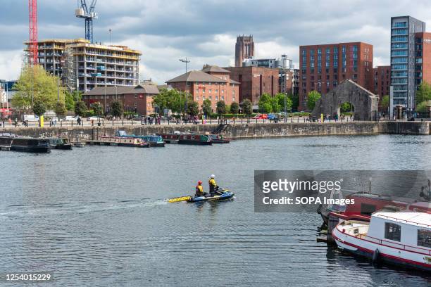 Members of the Coast Guard seen patrolling Salthouse Dock to ensure the safety of a large number of people who have arrived ahead of the Eurovision...