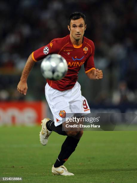 Mirko Vucinic of AS Roma in action during the UEFA Champions League Group A match between AS Roma and CFR Cluj at the Stadio Olimpico on September...