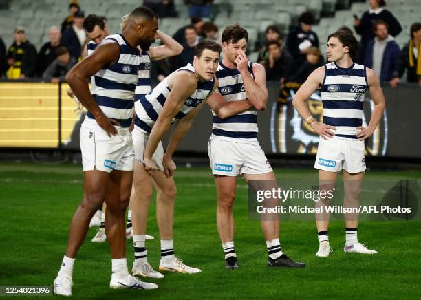 The Cats look dejected after a loss during the 2023 AFL Round 09 match between the Richmond Tigers and the Geelong Cats at the Melbourne Cricket...