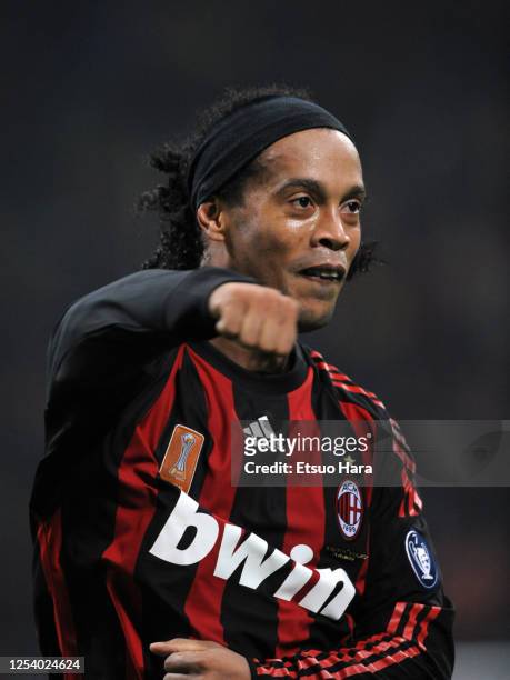 Ronaldinho of AC Milan celebrates scoring the opening goal during the Serie A match between AC Milan and Napoli at the Stadio Giuseppe Meazza on...