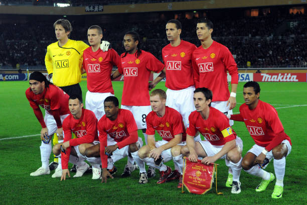 Manchester United players line up for the team photos prior to the FIFA Club World Cup semi final match between Gamba Osaka and Manchester United at...