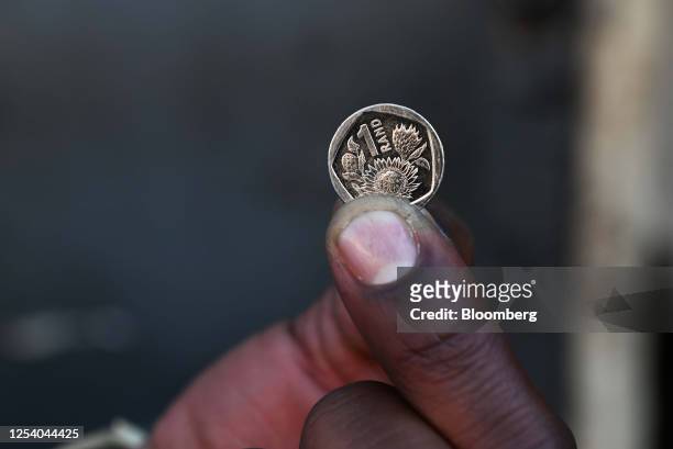 One rand coin arranged in Johannesburg, South Africa, on Friday, May 12, 2023. The rand slumped to its weakest level on record against the dollar and...