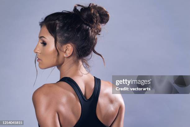 sweaty - messy hair bun stock pictures, royalty-free photos & images
