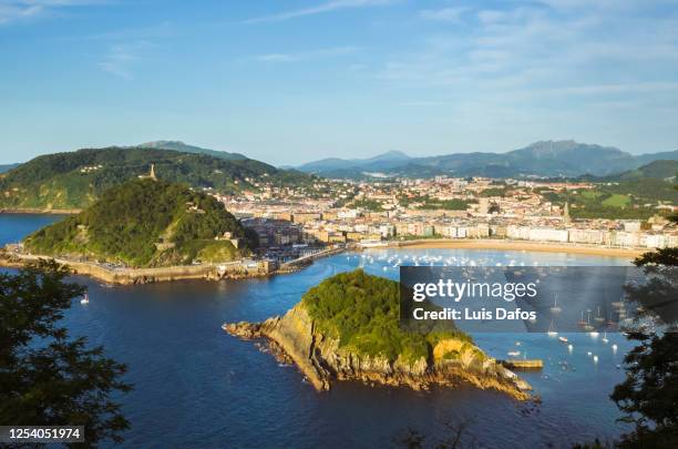 san sebastian and la concha bay overview - san sebastian spain beach stock pictures, royalty-free photos & images